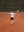 COURT7 Athlet trägt AD-IN Tee Off-White 200 in Off-White on-court — T-Shirt